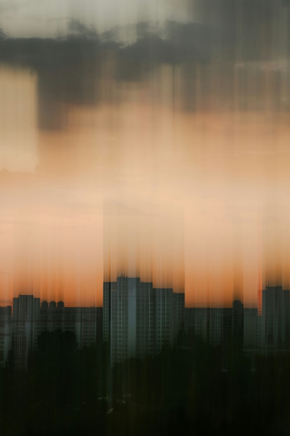 Apartment buildings with vertical motion blur